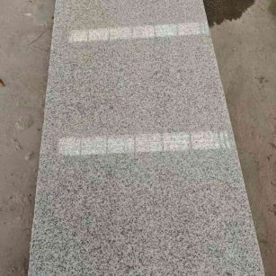 枣庄芝麻白光面毛板